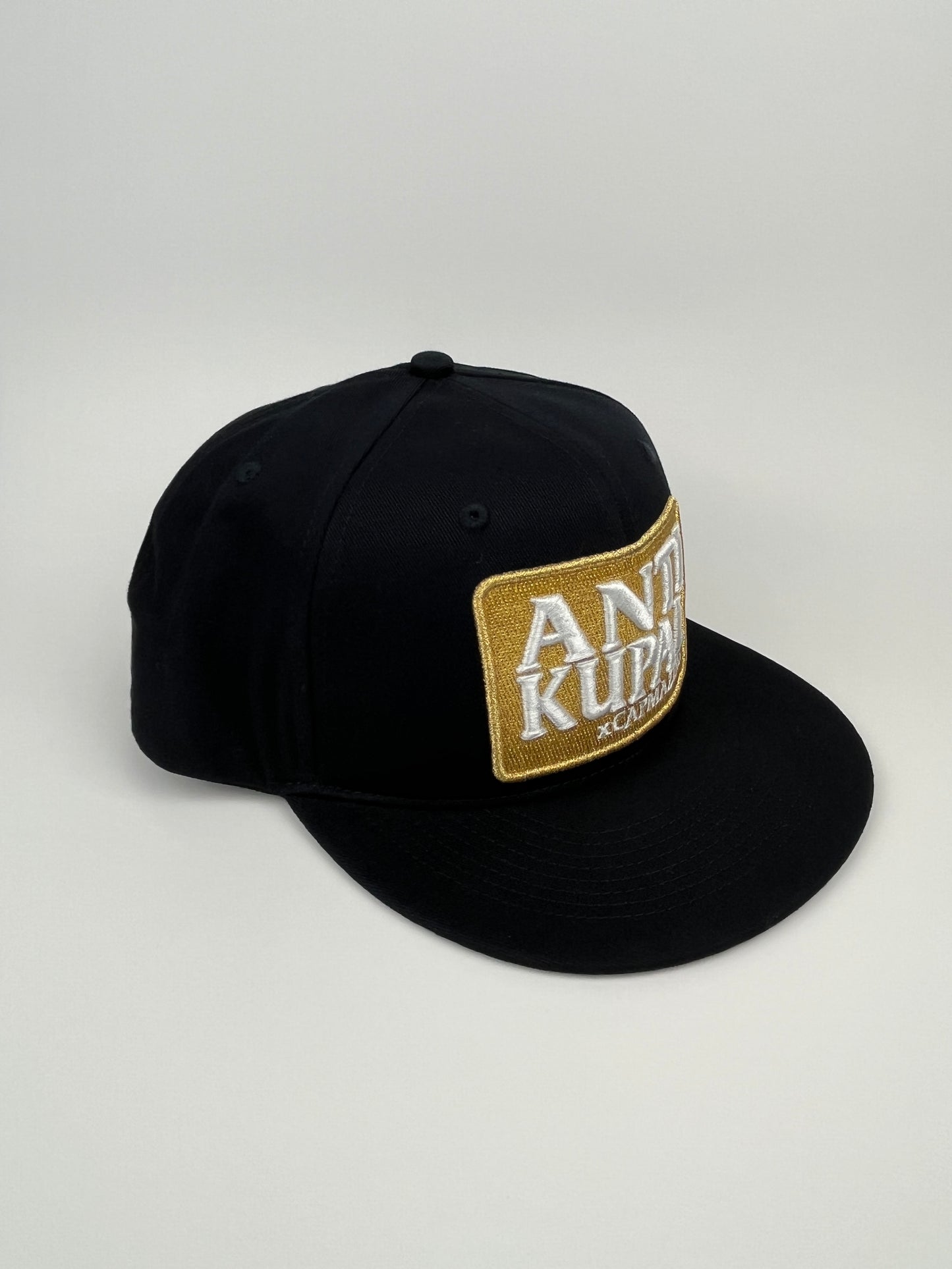Anti-Kupal x Capmazing Black Gold